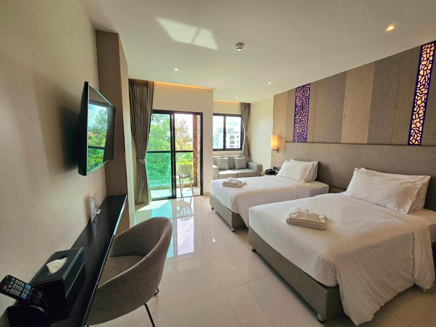 The Tj Hotel Jomtien Bagian luar foto